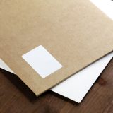 white paper on brown wooden table